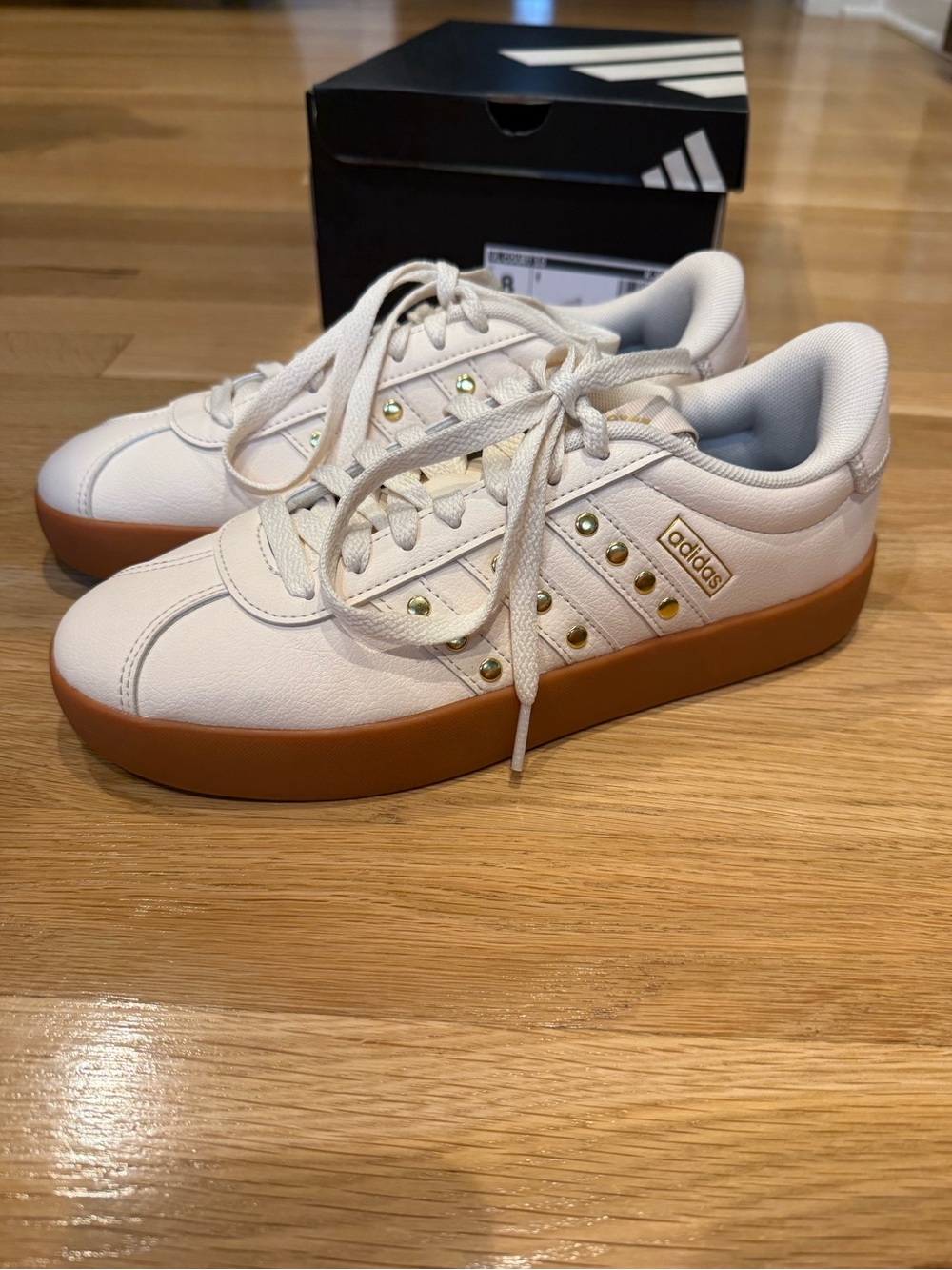 adidas Women’s Cream Sneakers with Gold Accents